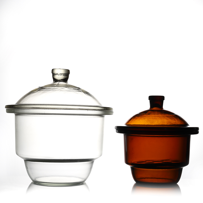 Clear and amber Vacuum Desiccator with ground-in stopcock and porcelain plate (1)